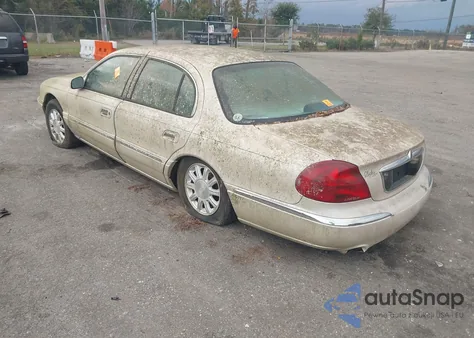 1999 Lincoln Continental z USA, uszkodzony, nr VIN 1LNHM97V1XY697540